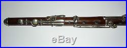 Antique Figured rosewood flute possibly German along with similar piccolo