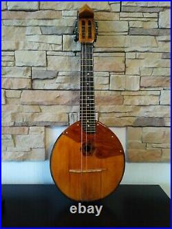 Domra piccolo Folklore instrument. Balalaika. Ukrainian, Russian folk instrument