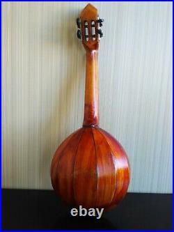 Domra piccolo Folklore instrument. Balalaika. Ukrainian, Russian folk instrument