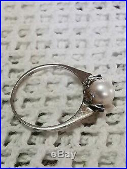 Grazioso piccolo anello oro bianco 750 perla giappone acqua salata 2 zaffiri