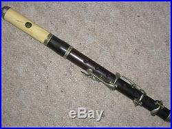 Very old wooden Piccolo flute with BONE head